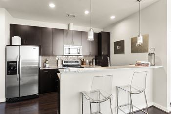 Allure Hermann Park | Kitchen with Stainless Steel Appliances
